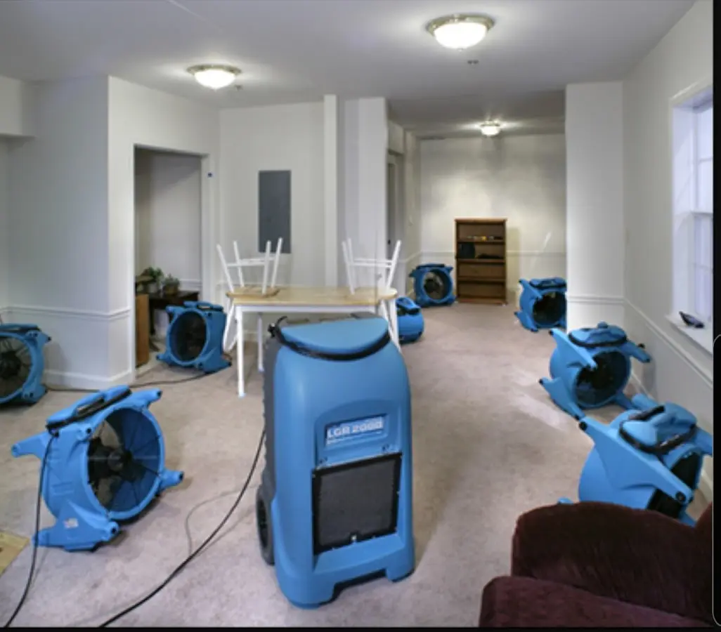 Air movers and dehumidifier setup for Water Damage Restoration in North Hobbs